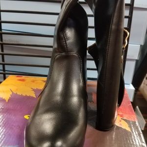 Black and gold boots